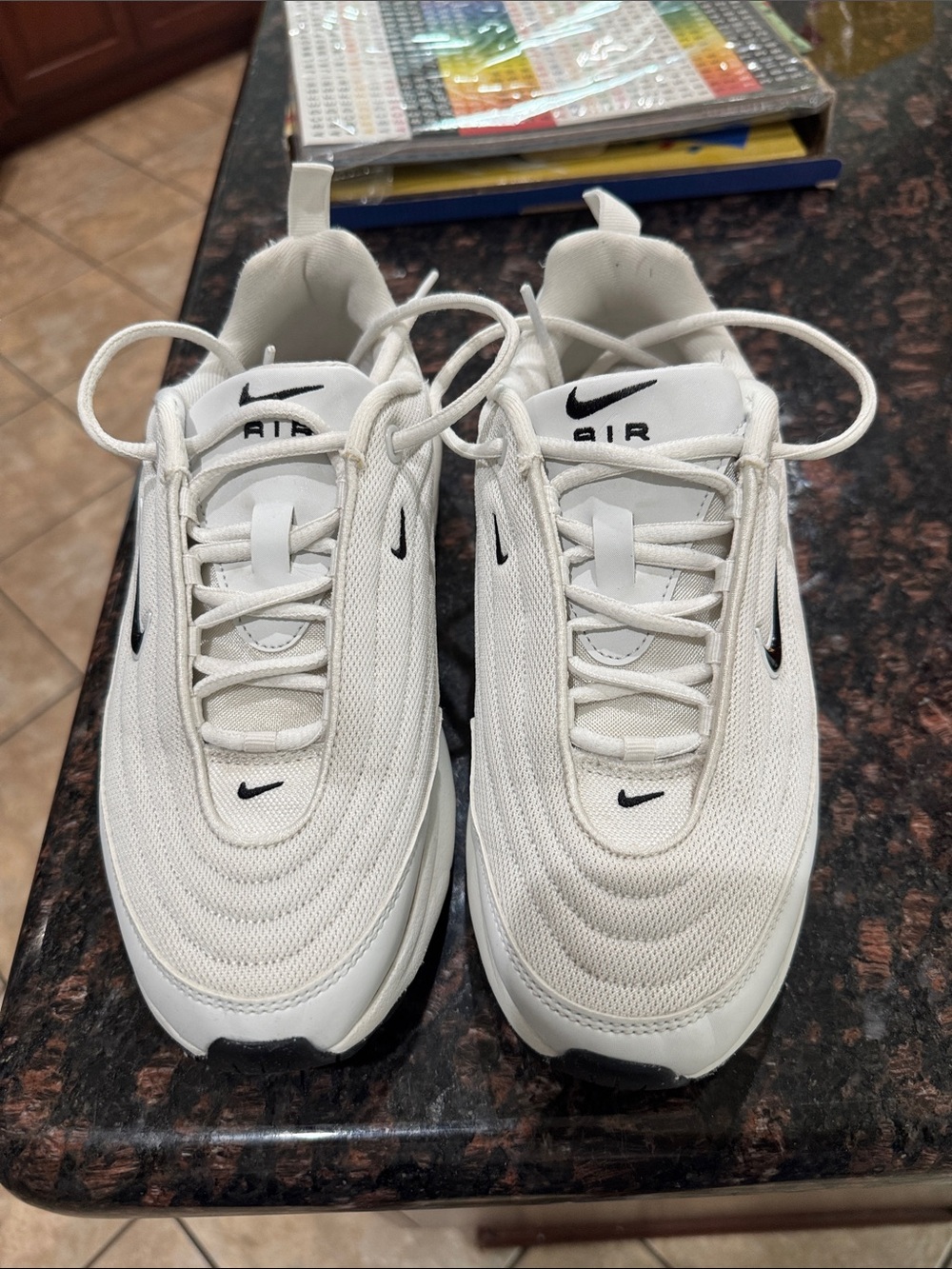 Nike women’s White Low-Top Mesh Sneakers with Black Swoosh